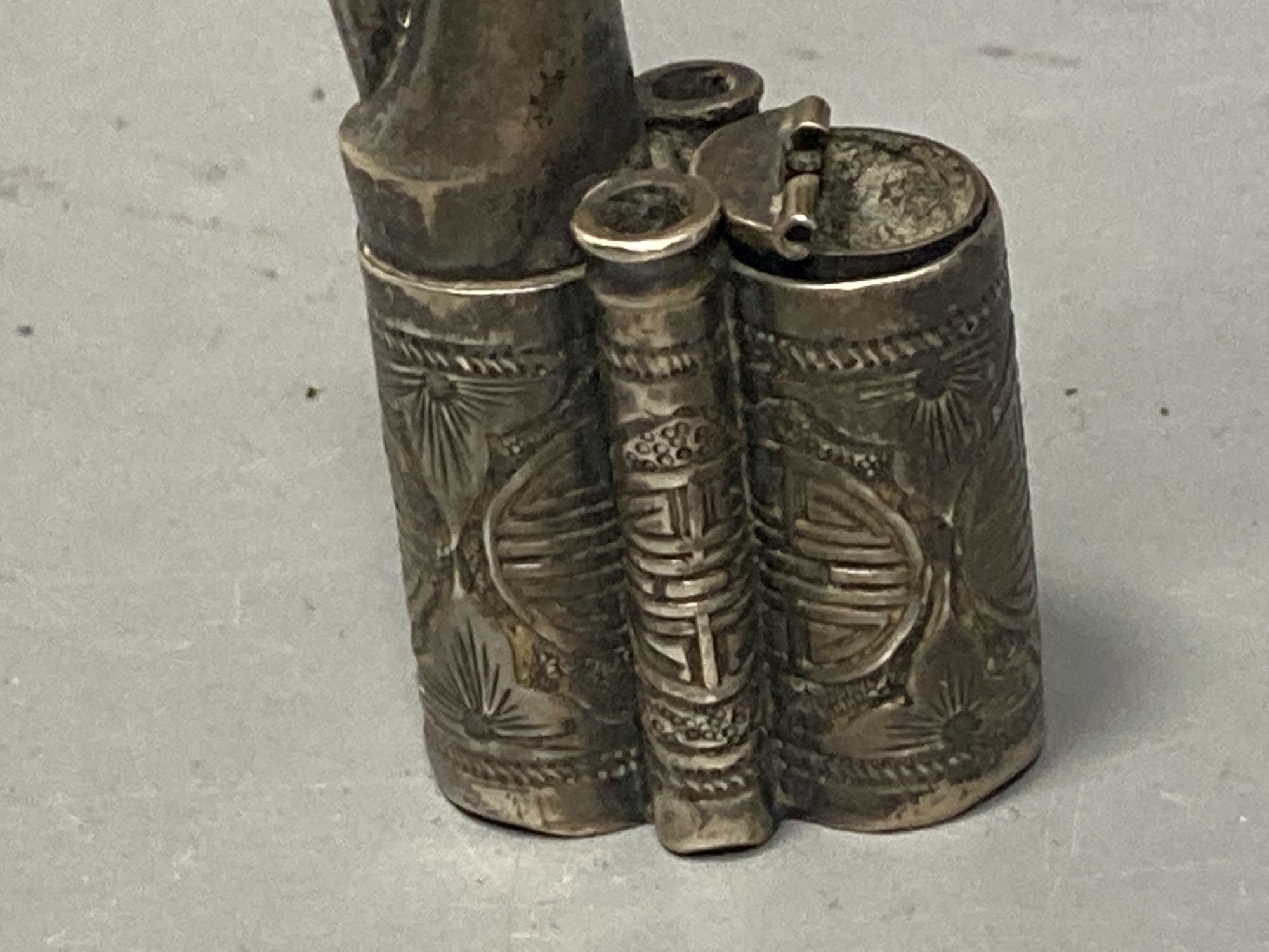 A Chinese white metal water pipe, by Wang Hing, 11.2cm, gross 27 grams.